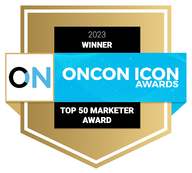 A gold shield-shaped award badge featuring the text '2023 Winner', 'ONCON ICON AWARDS', and 'Top 50 Marketer Award' on a black background with a blue ribbon design.