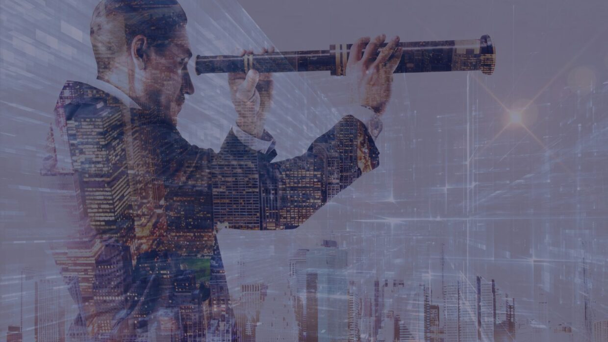 A businessman looking through a telescope, with a double exposure effect showing a city skyline and digital elements. This image relates to the theme of Reflection on 2024 Cybersecurity Predictions.
