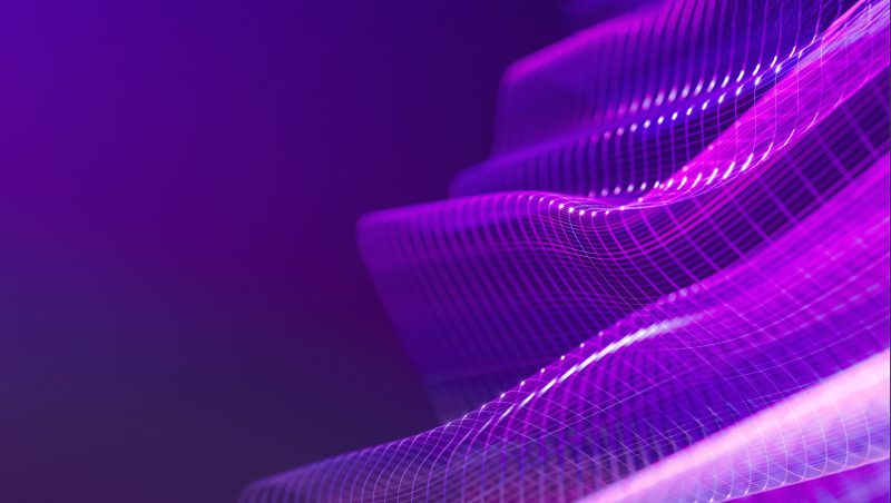 Abstract digital wave pattern in shades of purple and pink, creating a flowing, textured appearance against a dark background.