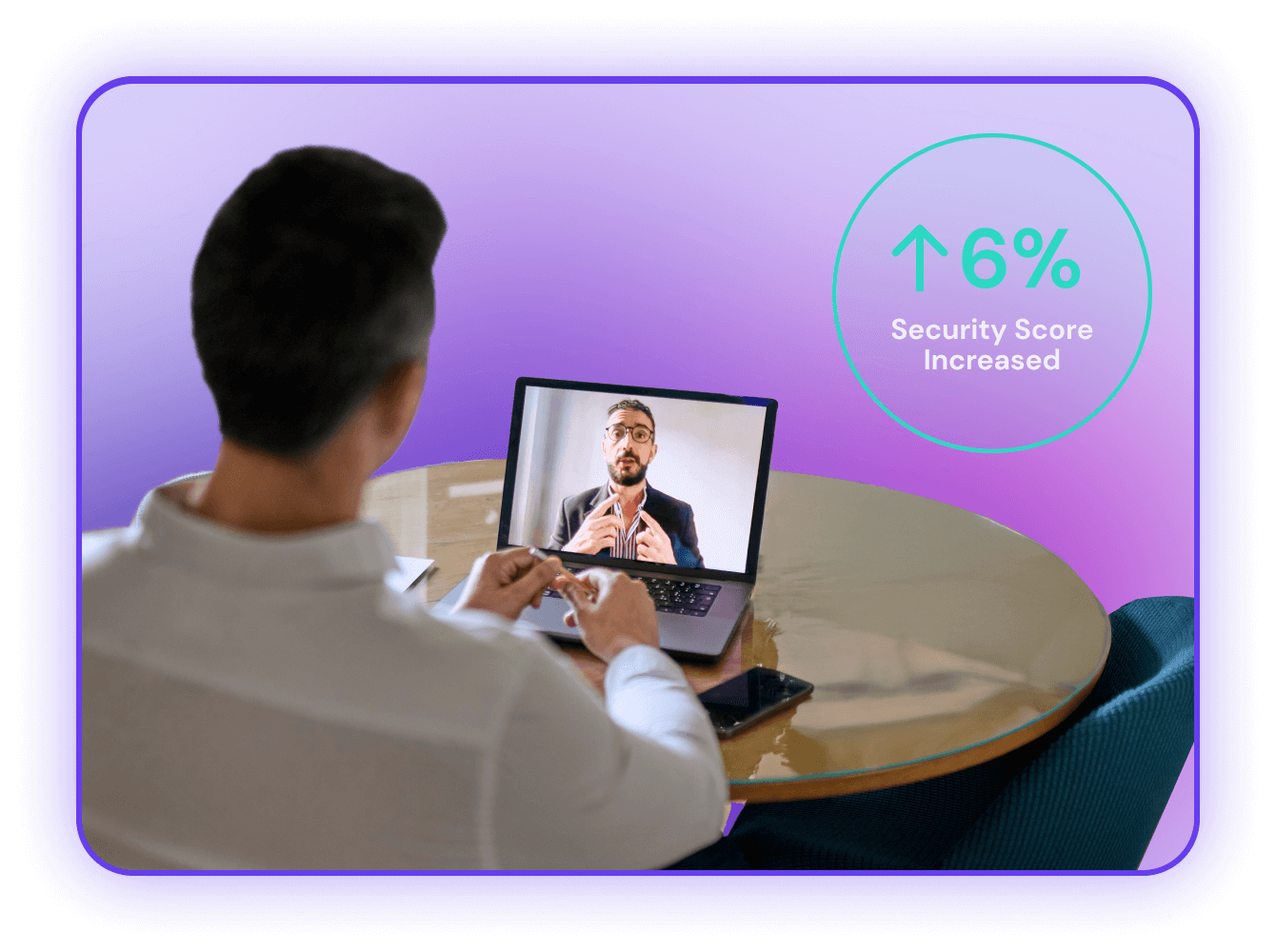 A person viewing a video call on a laptop while sitting at a table. The screen displays a male speaker explaining something, with a graphic showing a 6% increase in security score.
